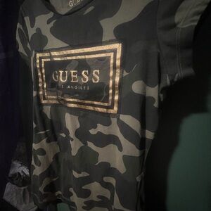 NWOT - GUESS- Sterling-  Black Camo Tee with Metallic Gold Logo